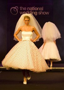 Candy Anthony do stunning 50's and 60's style wedding dresses such as the one pictured here. 