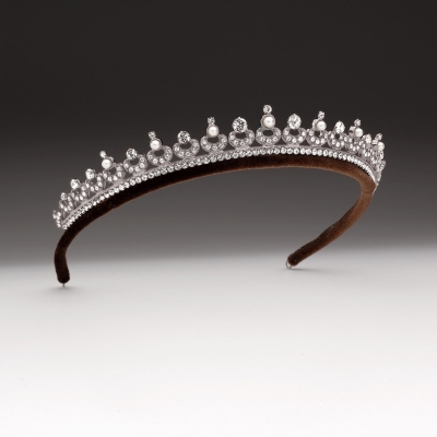 For me, nobody makes more 'princess like' tiaras than Andrew Prince. This 'Low seven pearl and crystal crescent tiara is £340.